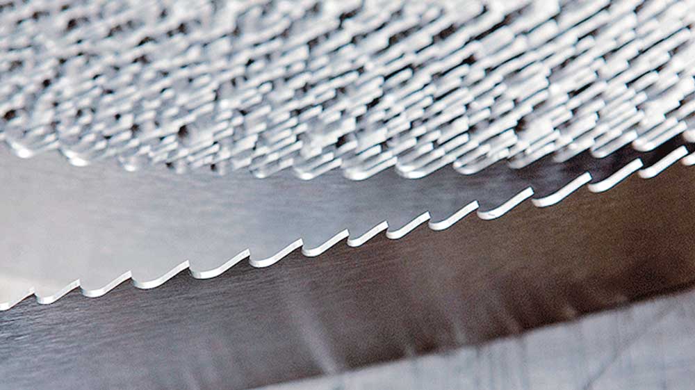 Soluciones de afilado para sierras de cinta y de bastidor – Máquina para centro de producción Soluciones de afilado para sierras de cinta y de bastidor – Máquina para centro de producción